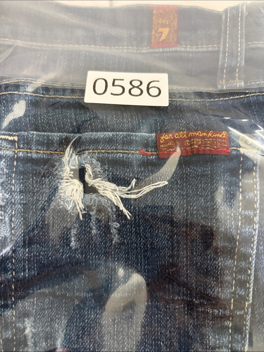 7 For All Mankind Mid-Rise 4.5" Rolled Cuff Distressed Denim Shorts (25) - Picture 8 of 8
